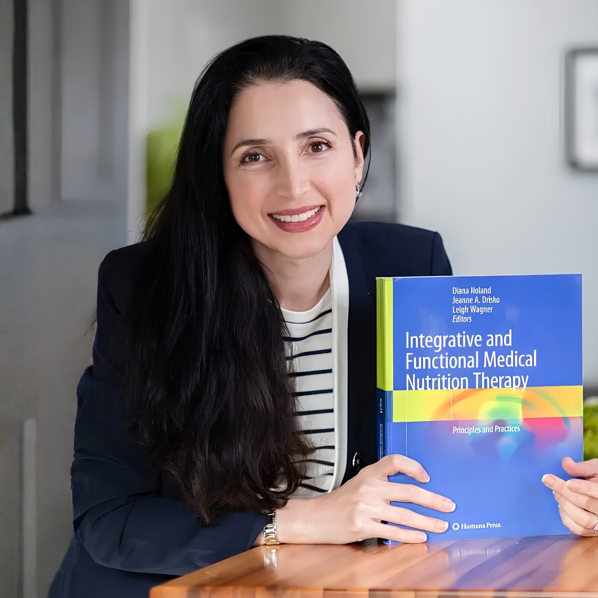 Registered dietitian Zahra Tromsness smiling, IBS and gut health specialist in Kelowna